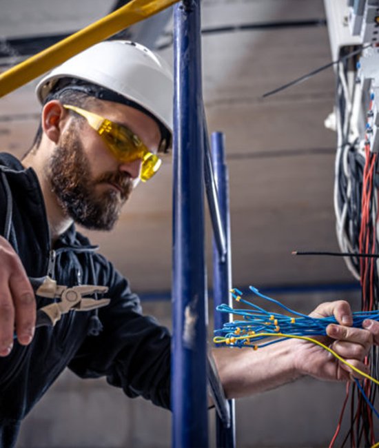 Electrical professionals at work